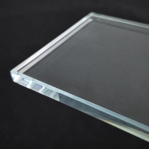 Ultra clear heat soaked glass